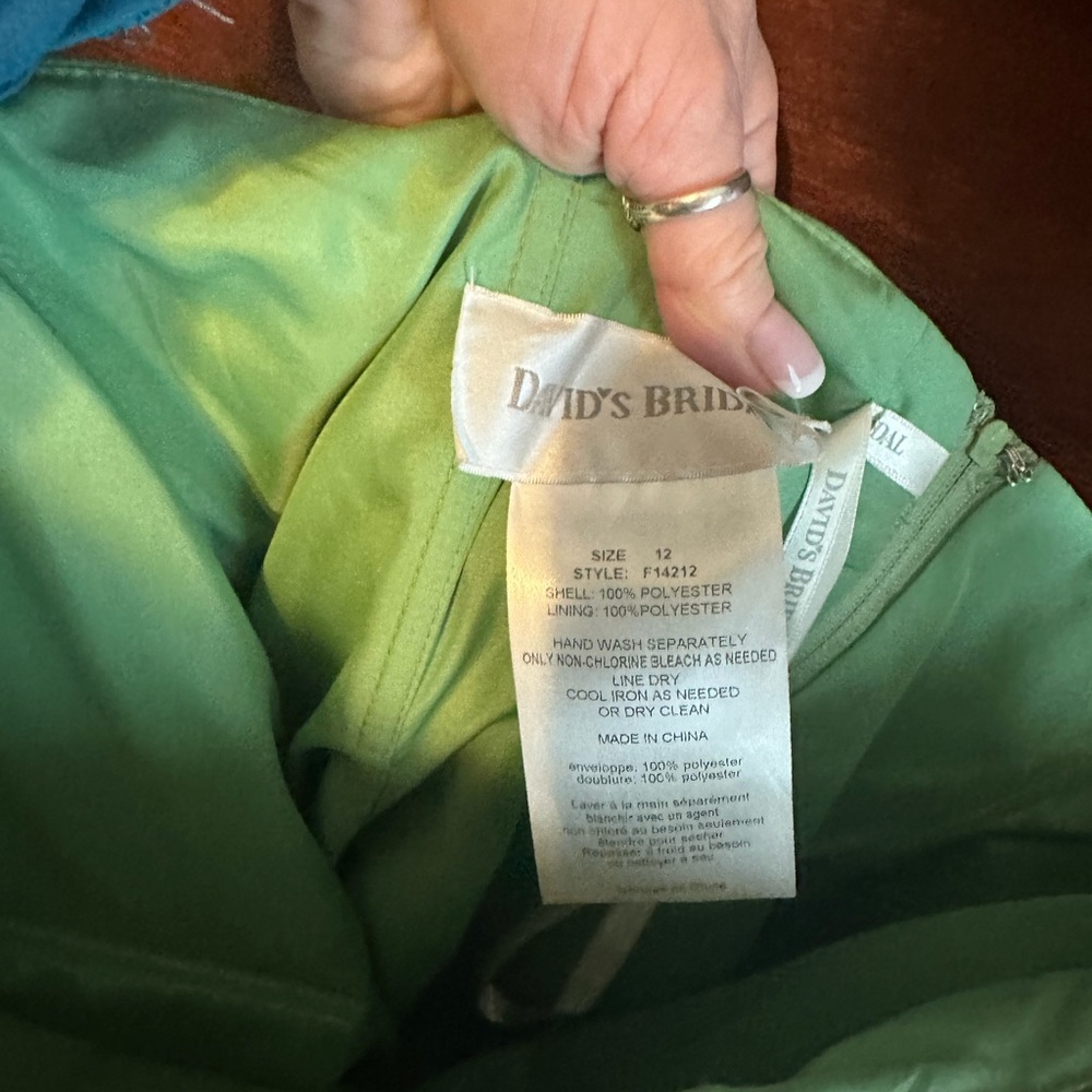 Cute brides maid strapless dress in a light green.